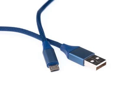 Blue USB-Lightning mobile charging cable isolated on white background.の写真素材