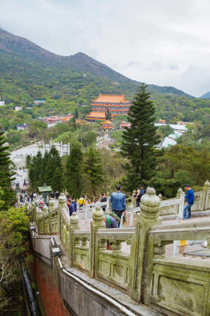 Hong Kong - March 21, 2016:The tourists on the stairs leading to the statue of Big Buddha in Po Lin Monasteryのeditorial素材