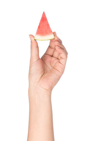 hand holding slice of watermelon isolated on white backgroundの写真素材