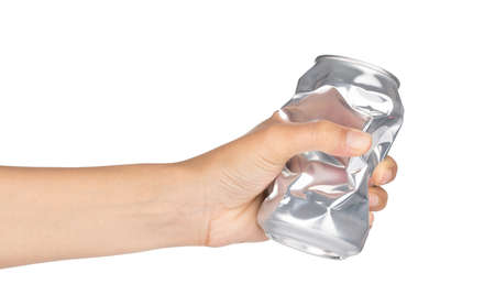 Hand with Crumpled empty blank beer can garbage,can recycle isolated on white background.