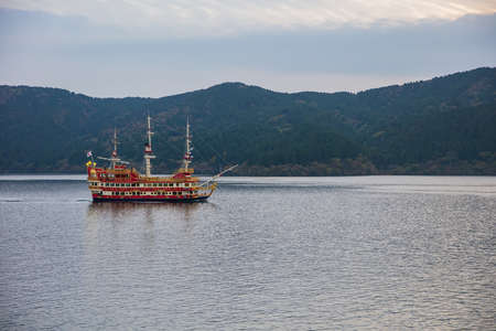 Fuji Mountain, JAPAN-October 21, 2016:Pirate cruise ship (kaizokusen) over Hakone's lake Ashi landscape.のeditorial素材