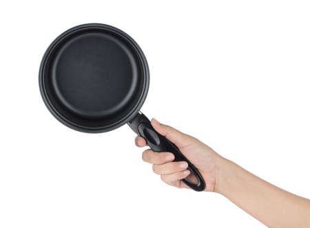 Hand holding sauce pan isolated on white background