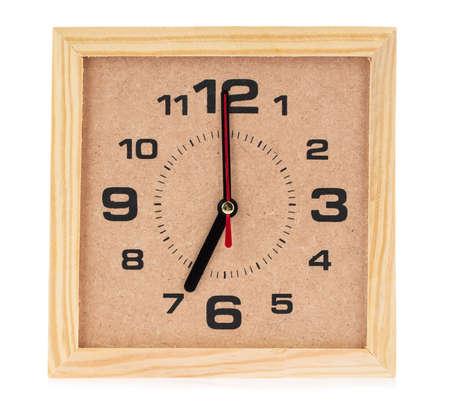 Decorative table desk wooden alarm Clock at 7 AM isolated on white backgroundの写真素材