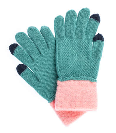 Warm woolen gloves isolated on white background