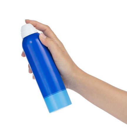 hand holding spray for sunblock isolated on white background