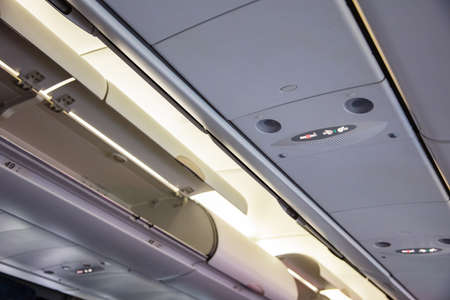 Luggage in the cabin on airplane.