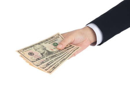 Businessman hand holding money dollars, 10 US dollar banknote isolated on white background