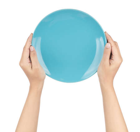 Hands holding a dish ceramic isolated on white backgroundの写真素材
