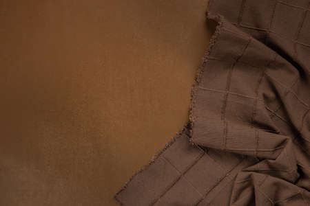 Brown tablecloth on brown background