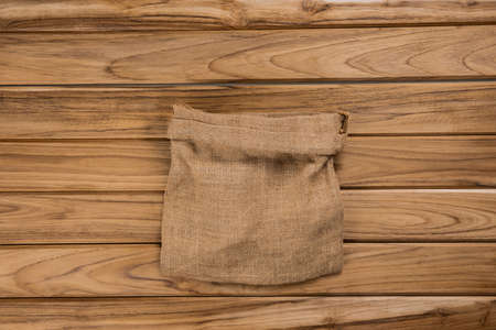 sack on pale table wood backgroundの写真素材