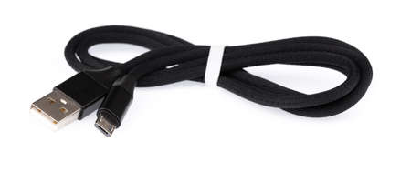 Black USB cable for smartphone isolated on white background.