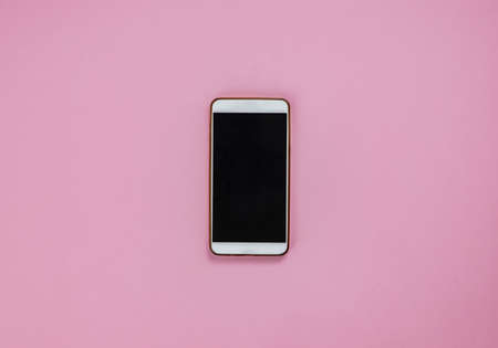 Smartphone With Blank Screen on a pink background の写真素材