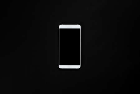 Smartphone With Blank Screen on a black background の写真素材