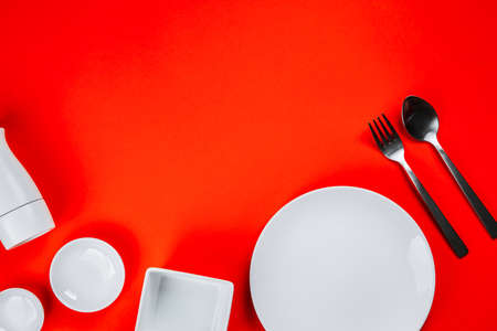 Kitchenware set on red background