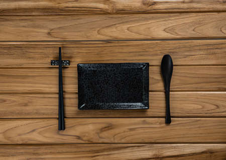 dish stoneware rests on wooden table
