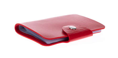 Red leather card holder isolated on a white backgroundの写真素材