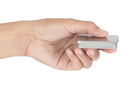 Hand holding aluminum silver box isolated on white background.の写真素材