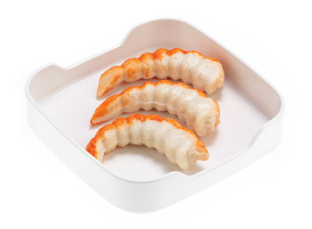imitation shrimp on plate for shabu shabu isolated on white backgroundの写真素材
