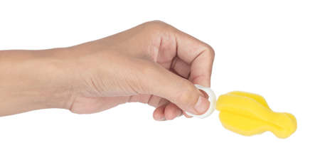Hand holding Sponge for Clean nipple isolated on white background
