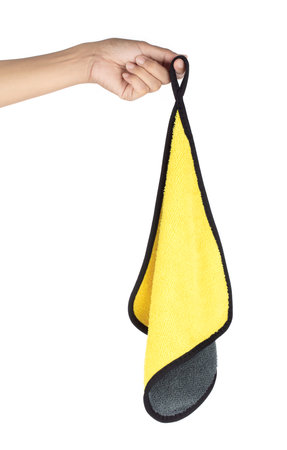 Hand holding Microfiber Cleaning Cloth isolated on white background.