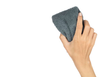 Hand holding Microfiber Cleaning Cloth isolated on white background.の写真素材
