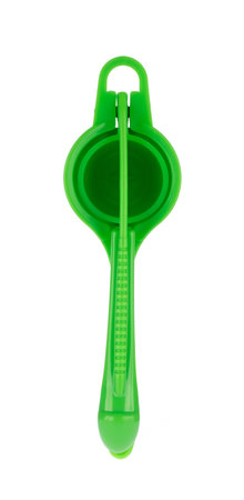 Manual green lemon squeezer isolated on white background.