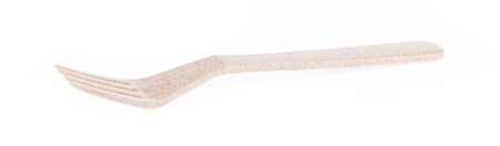 Biodegradable plastic fork isolated on white background