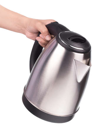 Hand holding Modern electric kettle isolated on white background.