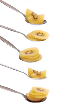 Set spoon of kiwi isolated on white backgroundの写真素材