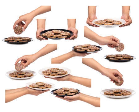 Collection of hand holding cookies with topping sprinkle on plate Isolated on White Background