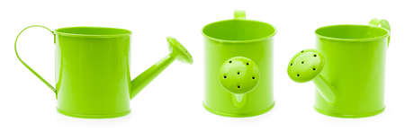 Set of green watering can isolated on white background.の写真素材