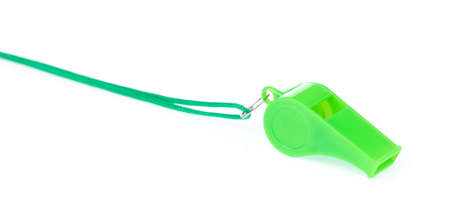 green blue whistle isolated on white backgroundの写真素材