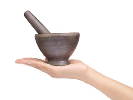 hand holding mortar isolated on white backgroundの写真素材