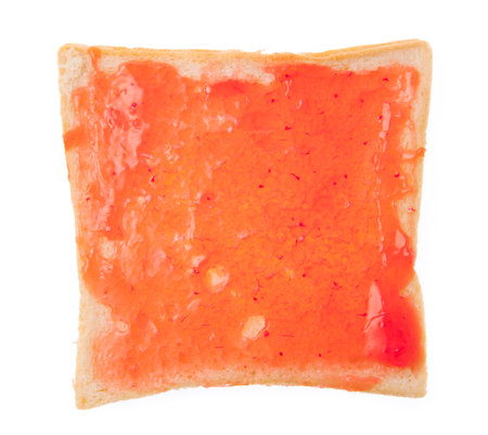 bread with strawberry jam isolated on white background