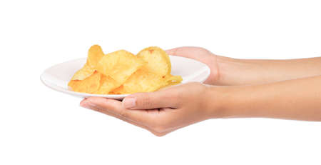 hand holding Potato chips on dish isolated on white background