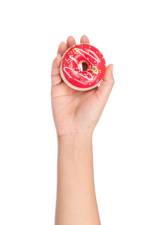 hand holding Toy Donut pattern rubber isolated on white background.の写真素材