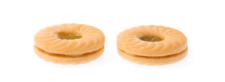 cookie biscuits with jam kiwi isolated on white background.の写真素材