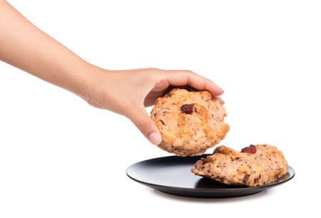 hand holding strawberries bread on dish isolated on white background.