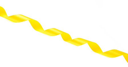 yellow ribbon isolated on white background.の写真素材