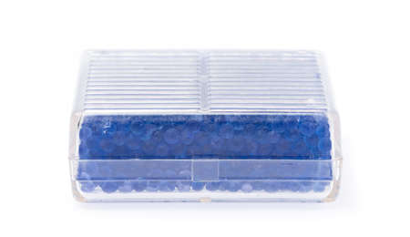 Blue silica gel, for moisture absorbing in box isolated on white backgroundの写真素材