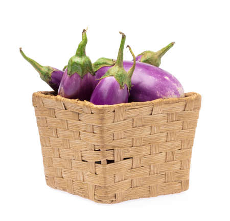 basket of eggplant isolated on white backgroundの写真素材