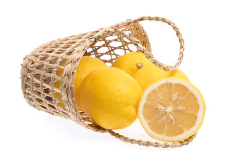basket wicker of Lemon isolated on white backgroundの写真素材