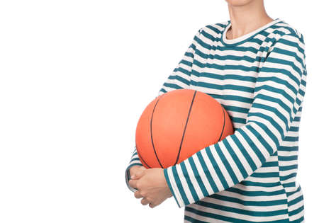 hand holding basketball orange rubber isolated on white backgroundの写真素材