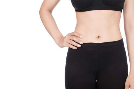 Shapely woman in black tights isolated on white backgroundの写真素材