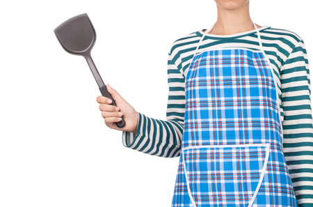 chef holding kitchenware isolated on white backgroundの写真素材