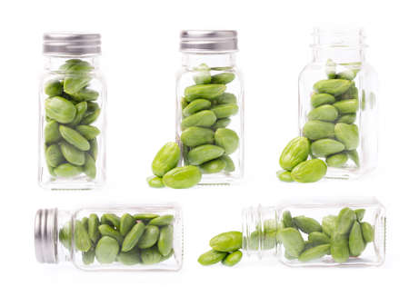 collection of bottle of Parkia speciosa seeds isolated on white backgroundの写真素材