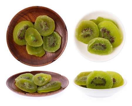 Set of Dried kiwi on plate isolated on white backgroundの写真素材