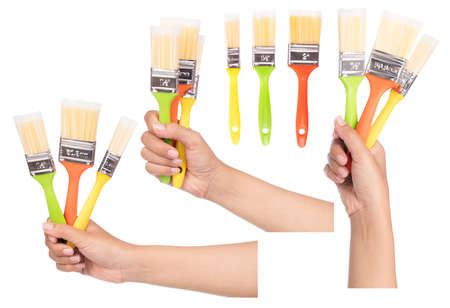 Set of hand holding Paintbrush isolated on white background.