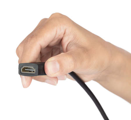 hand holding converter HDMI isolated on a white backgroundの写真素材
