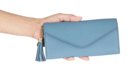 Hand holding leather blue wallet purse isolated on white background